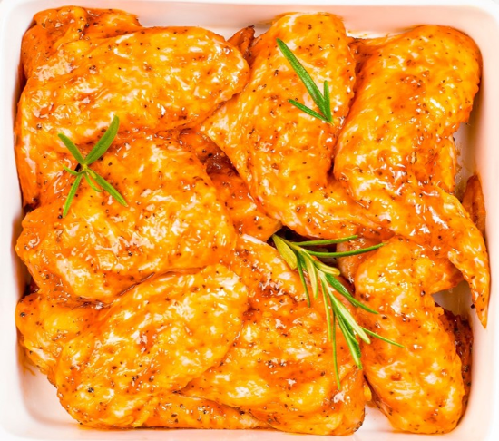 Image de Ailes de poulet fermier marinées - Maître d'hôtel - (Barquette)